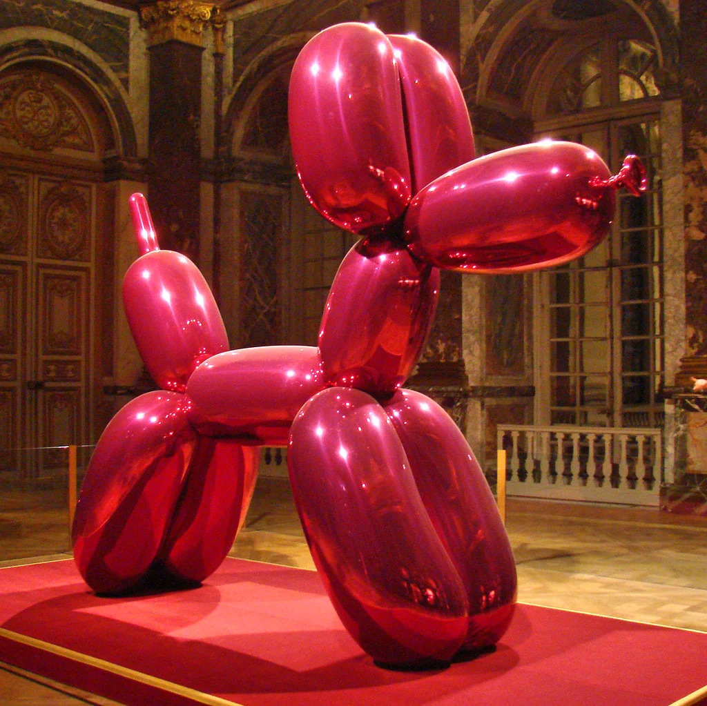A Balloon Dog Pink in the castle of Versailles, France 